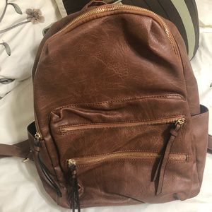Medium brown leather backpack